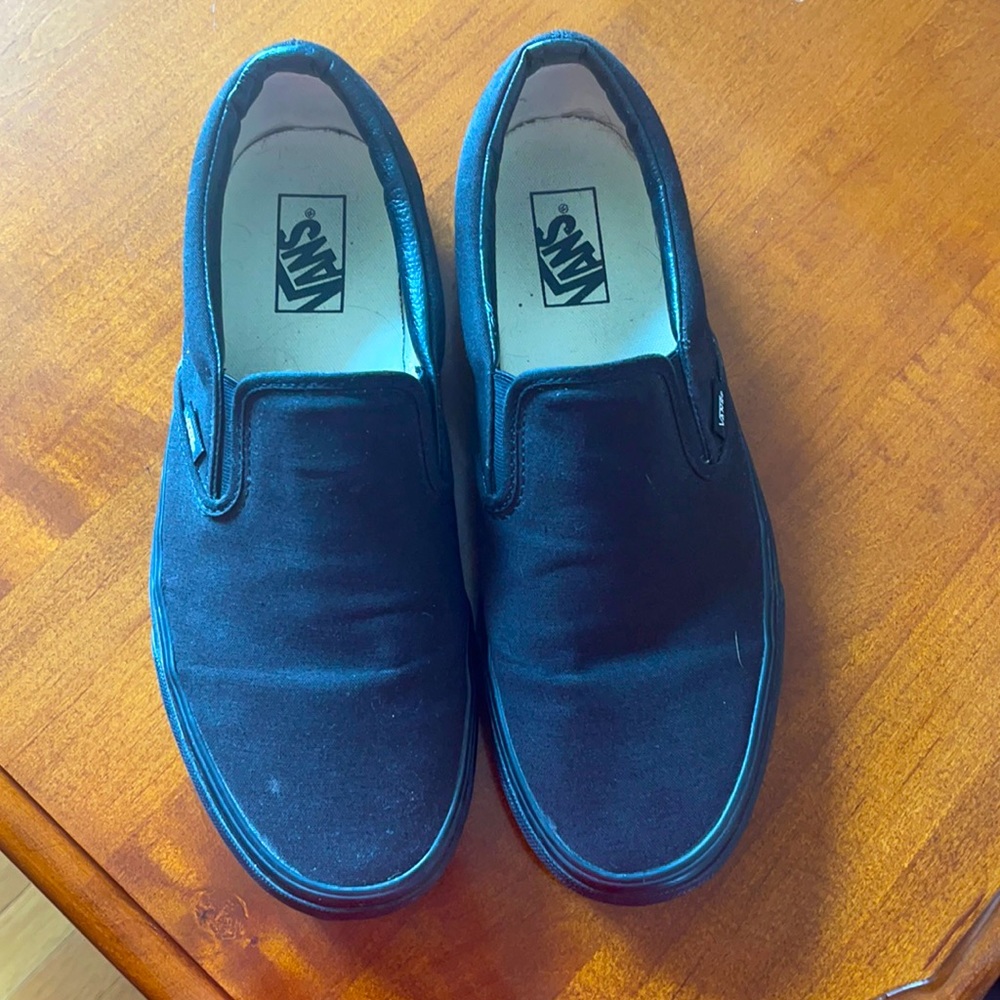 Black Men’s Vans Slip On canvas shoes. Size 11.5